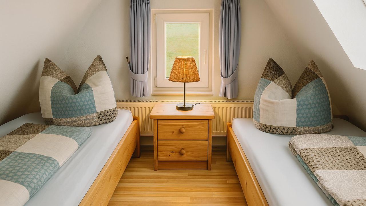 Schlafzimmer im Dachgeschoss Schlafzimmer im Dachgeschoss